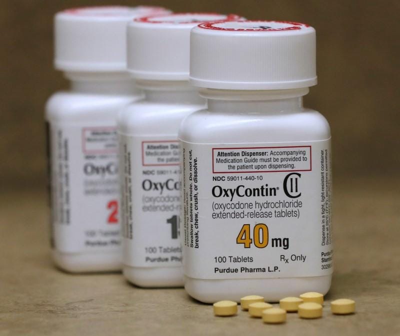 Exclusive JPMorgan cuts ties with OxyContin maker Purdue Pharma  sources