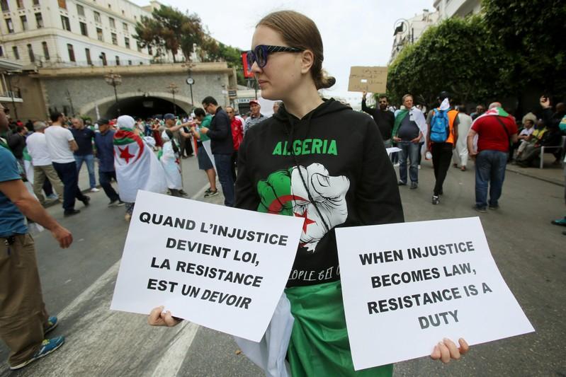 Thousands of Algerian protesters demand reforms presidential vote delay