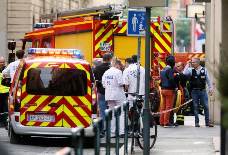 French police hunt suitcase bomber after blast in Lyon