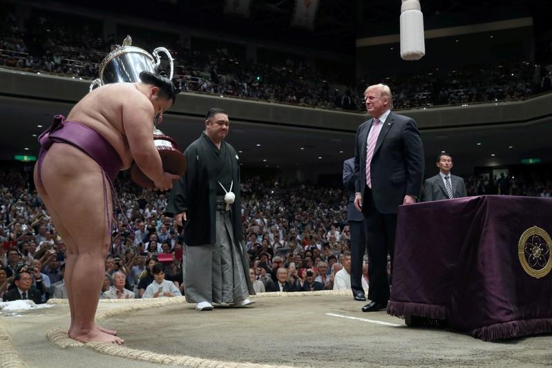 Trump watches quotincrediblequot sumo wrestling in Japan