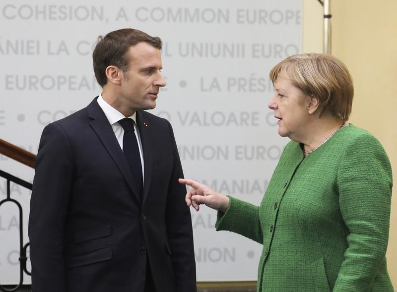 Macron Merkel seek common ground on EU Commission president pick official