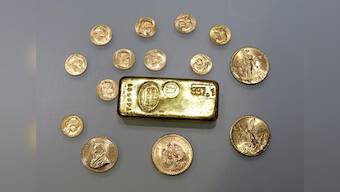 Gold eases as dollar bounces back from multi-week lows