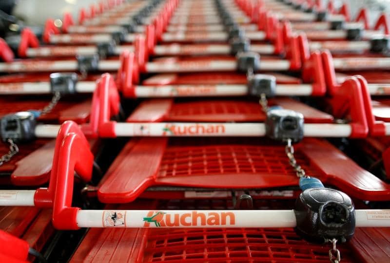 Italy to track jobs impact of Auchans sale of Italian assets