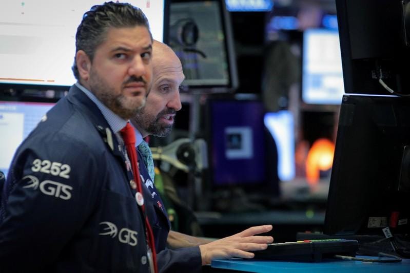 Wall Street falls as trade tensions stoke growth fears