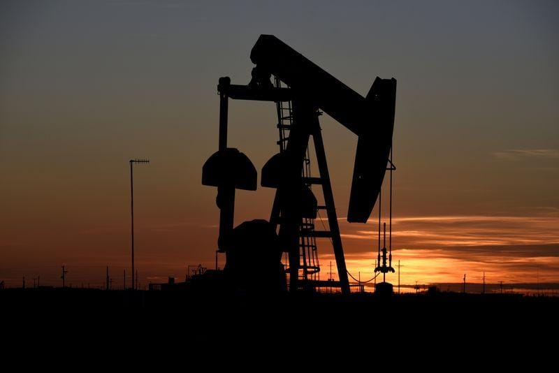 Oil set for a second weekly gain on demand hopes output shutins