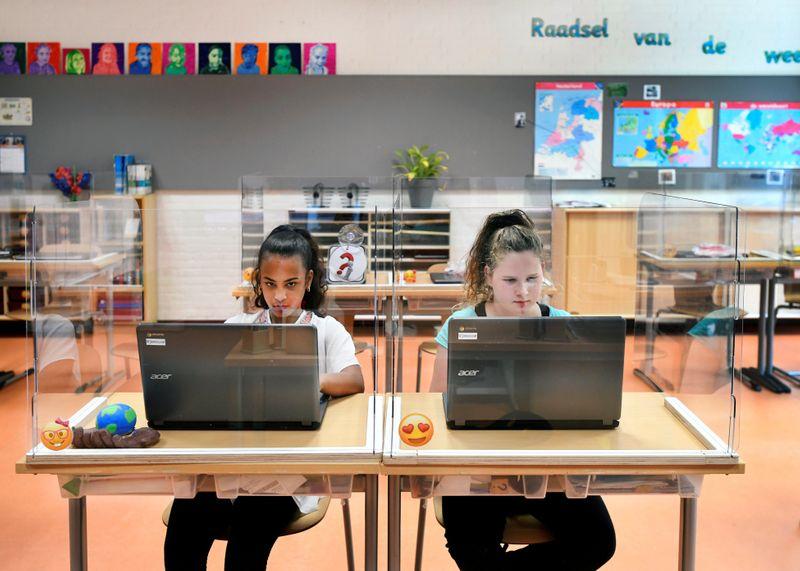 Plastic shields in place Dutch schools to reopen amid coronavirus