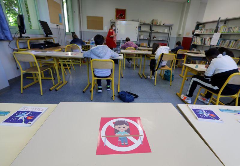 French primary pupils trickle back to class after eightweek lockdown