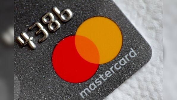 Mastercard will not send staff back to offices without coronavirus vaccine - exec
