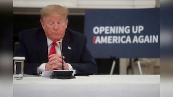 Trump says protesters would have met 'vicious dogs' if White House fence breached