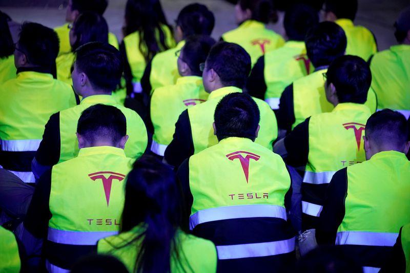 Exclusive Tesla under scrutiny in China steps up engagement with regulators  sources