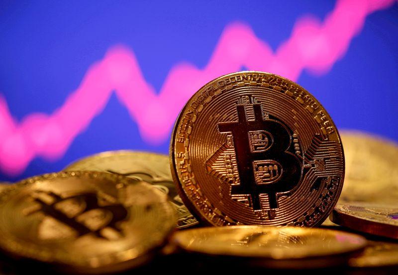 Bitcoin drops after report Binance under US probe Tesla fallout