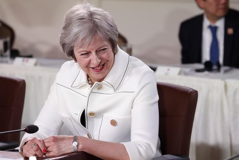 PM May faces another day of Brexit compromise in parliament