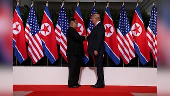 Trump in surprise summit move says he will halt Korea war games