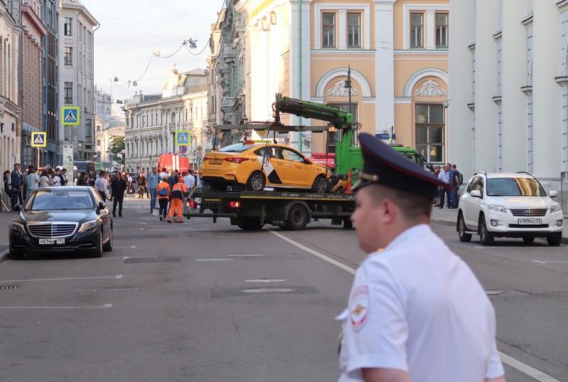 Taxi ploughs into Moscow crowd including soccer fans, hurts eight