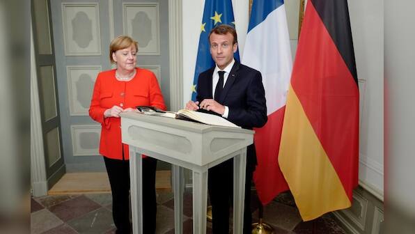Merkel, Macron back euro zone budget in 'new chapter' for bloc
