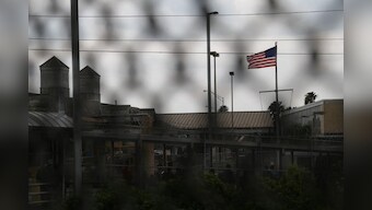 Trump tries to defuse immigrant crisis, but policy hit by confusion