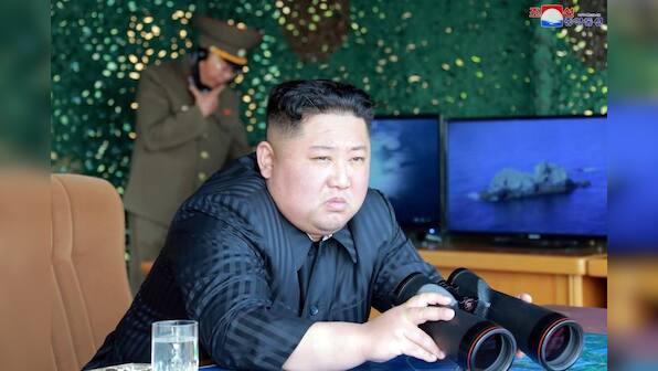 North Korea's Kim visits factories linked to missile launches