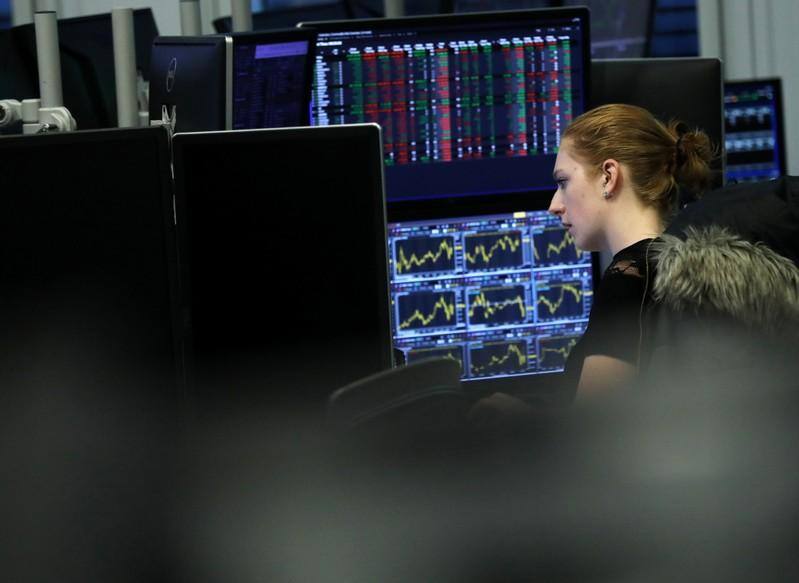 Oil tumbles on demand worries; stocks hit by trade and economic fears