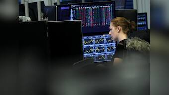 Oil tumbles on demand worries; stocks hit by trade and economic fears