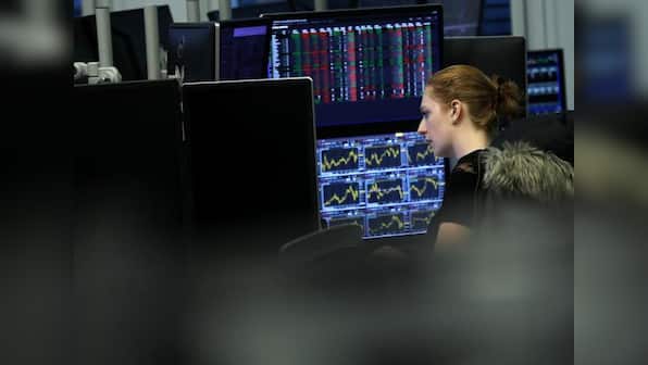 Oil tumbles on demand worries; stocks hit by trade and economic fears
