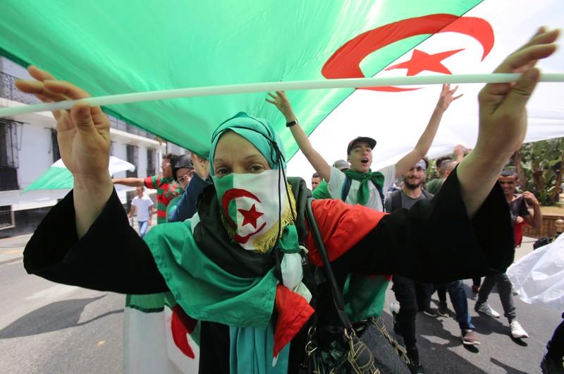Celebrating arrests but still pushing for change protesters rally in Algeria