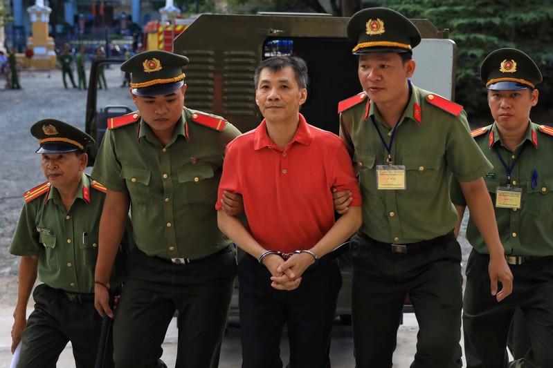 Vietnam jails American for 12 years on charge of attempting to overthrow state
