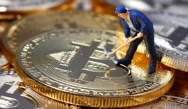 Bitcoin trades above $11,000, after 10% weekend jump