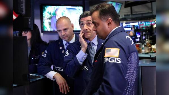 Stocks mostly flat ahead of G20; dollar slips