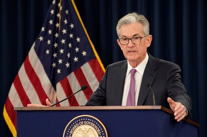 Powell says Fed insulated from politics wrestling with rate cuts