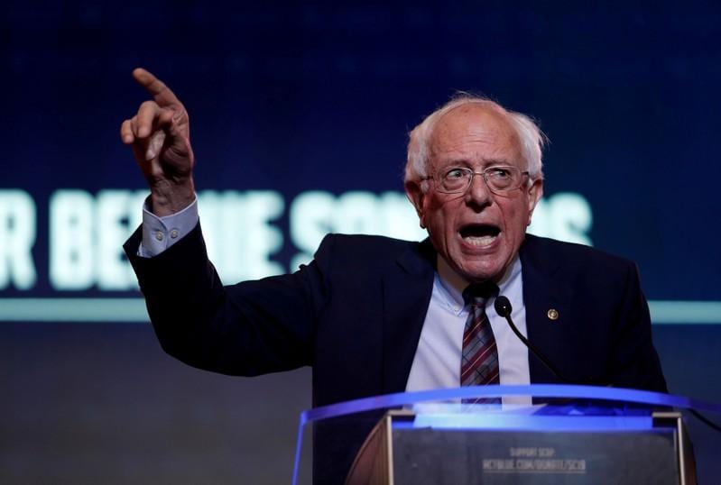 Sanders defends his bigspending plans as Democratic debate begins
