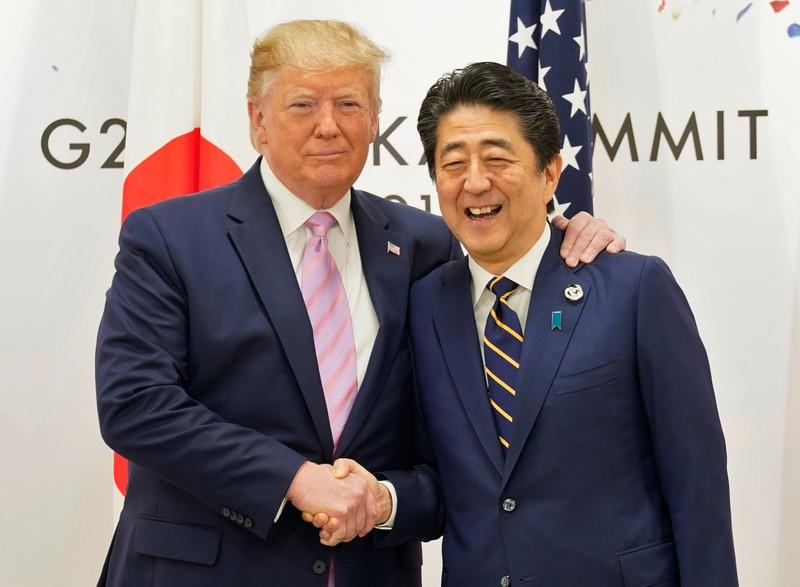 US President Trump says will talk trade with Japan PM Abe