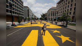 'Black Lives Matter' giant yellow mural painted on street near White House