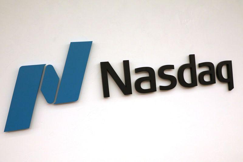 Nasdaq hits record high as US recession becomes official