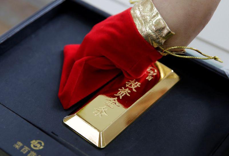 Gold vaults to highest since October 2012 as dollar stumbles