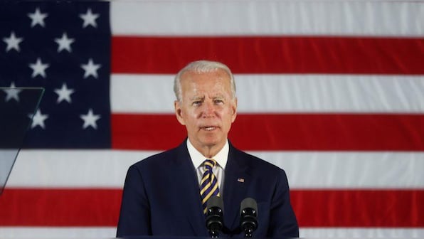 Biden attacks Trump health policy as 'cruel' in election battleground state