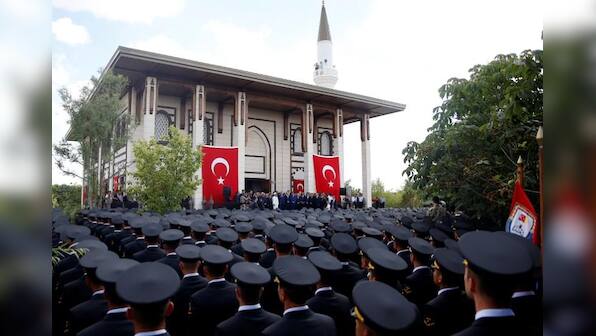 Erdogan sworn in with new powers, names son-in-law as finance minister