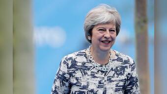 Britain's May bows to Brexit pressure in parliament