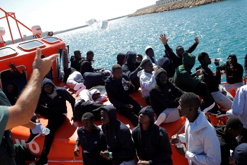 Over 600 migrants force entry into North African Spanish enclave ...