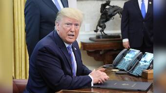 Trump says Iran 'playing with fire' after exceeding nuclear deal limit