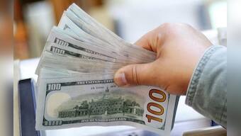 Dollar hobbled by lower U.S. yields, pound sags on dovish BoE