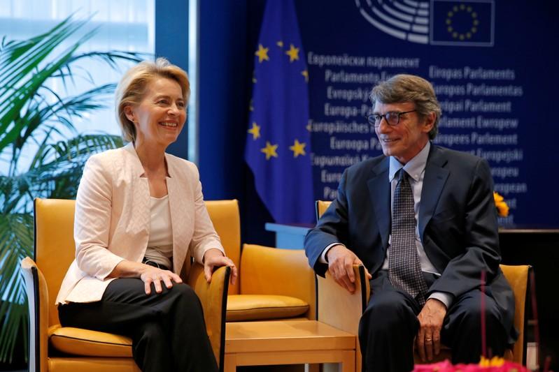 Germany’s Merkel absorbs domestic heat to get her woman to EU helm