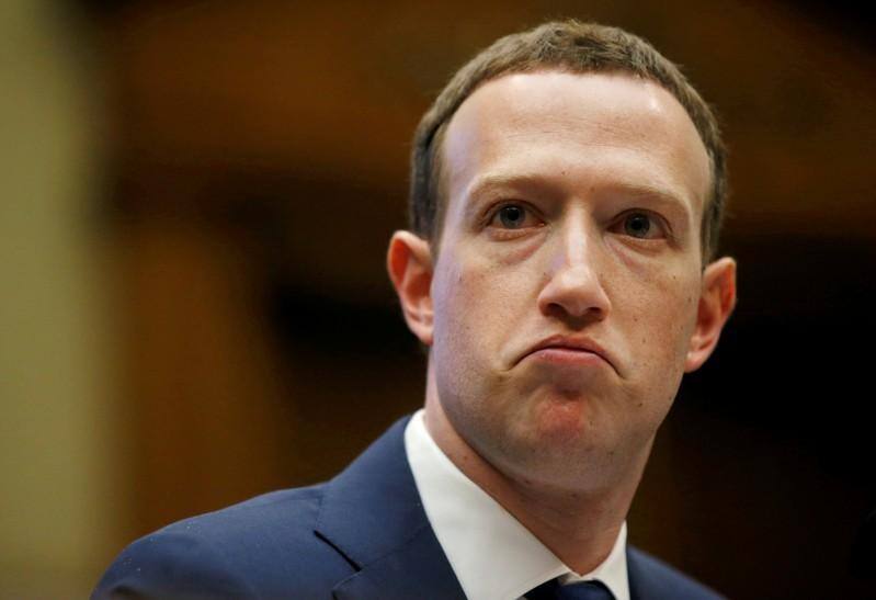 Fed chief calls for Facebook to halt Libra project until concerns addressed