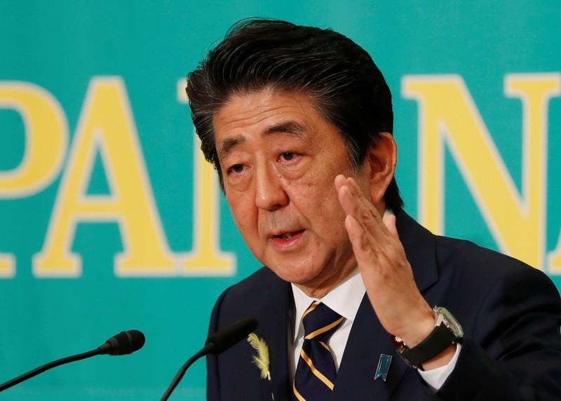 Japanese firms want Abe to keep big majority in upper house election  Reuters poll