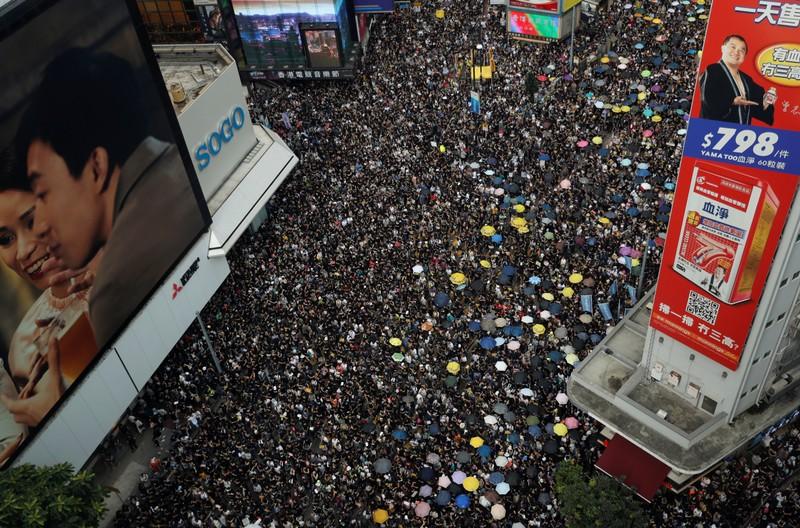 Hong Kong police fire rubber bullets tear gas as protests descend into chaos