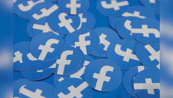 Facebook warns of costly privacy changes, discloses another U.S. probe