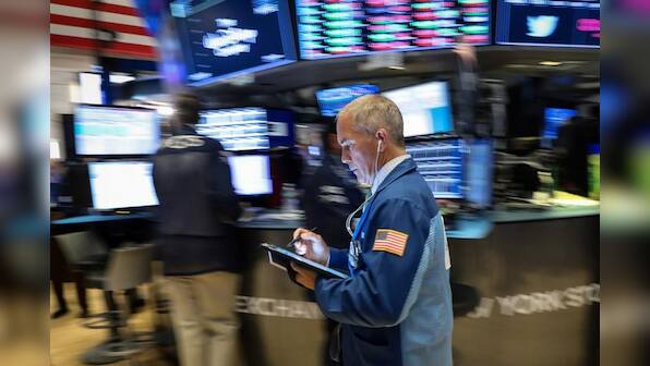 Wall Street falls after earnings and ECB's Draghi disappoint