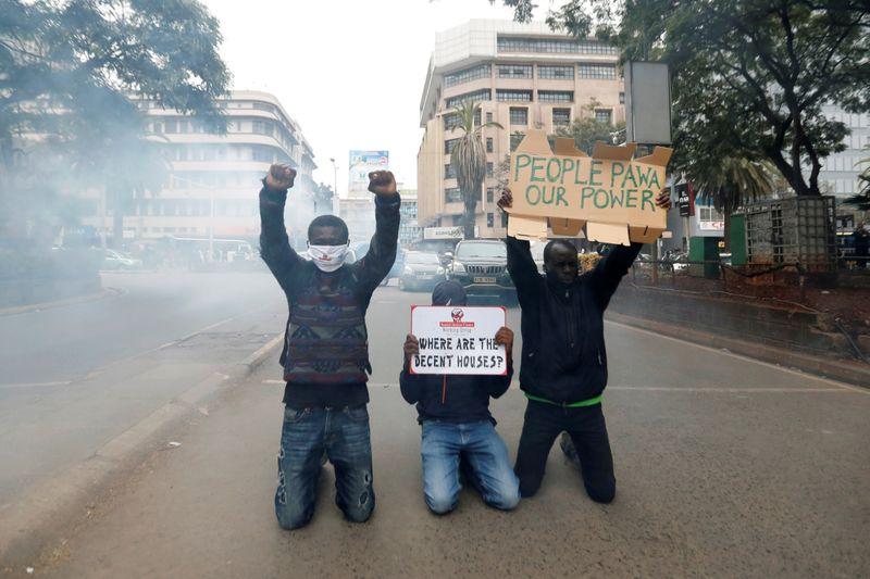Kenyan police fire teargas arrest marchers protesting at brutality