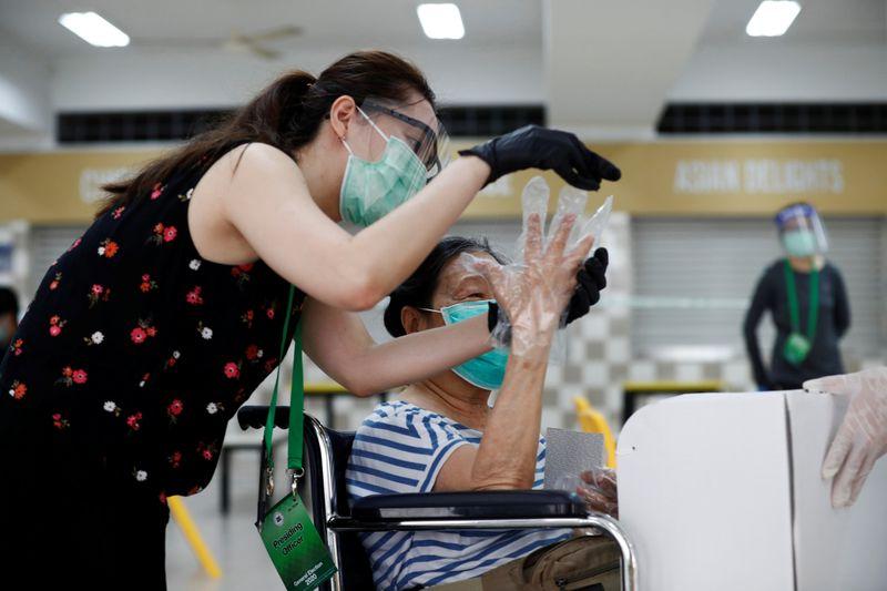Singapores ruling PAP cedes ground to opposition in pandemic poll