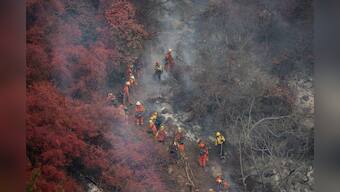 Climate change, COVID-19 stoke wildfire's economic risk, Fed says