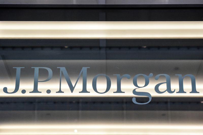 JPMorgan braces for loan losses as trading props up profit